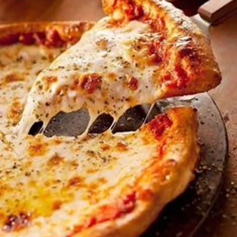 Indulge in Our Cheese Pizza